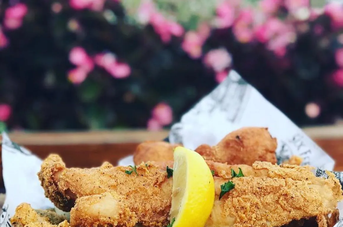 W. H. Stiles Fish Camp signature dishes Smoked Trout
Gulf Jumbo Lump Crab Fritter
Crispy Catfish